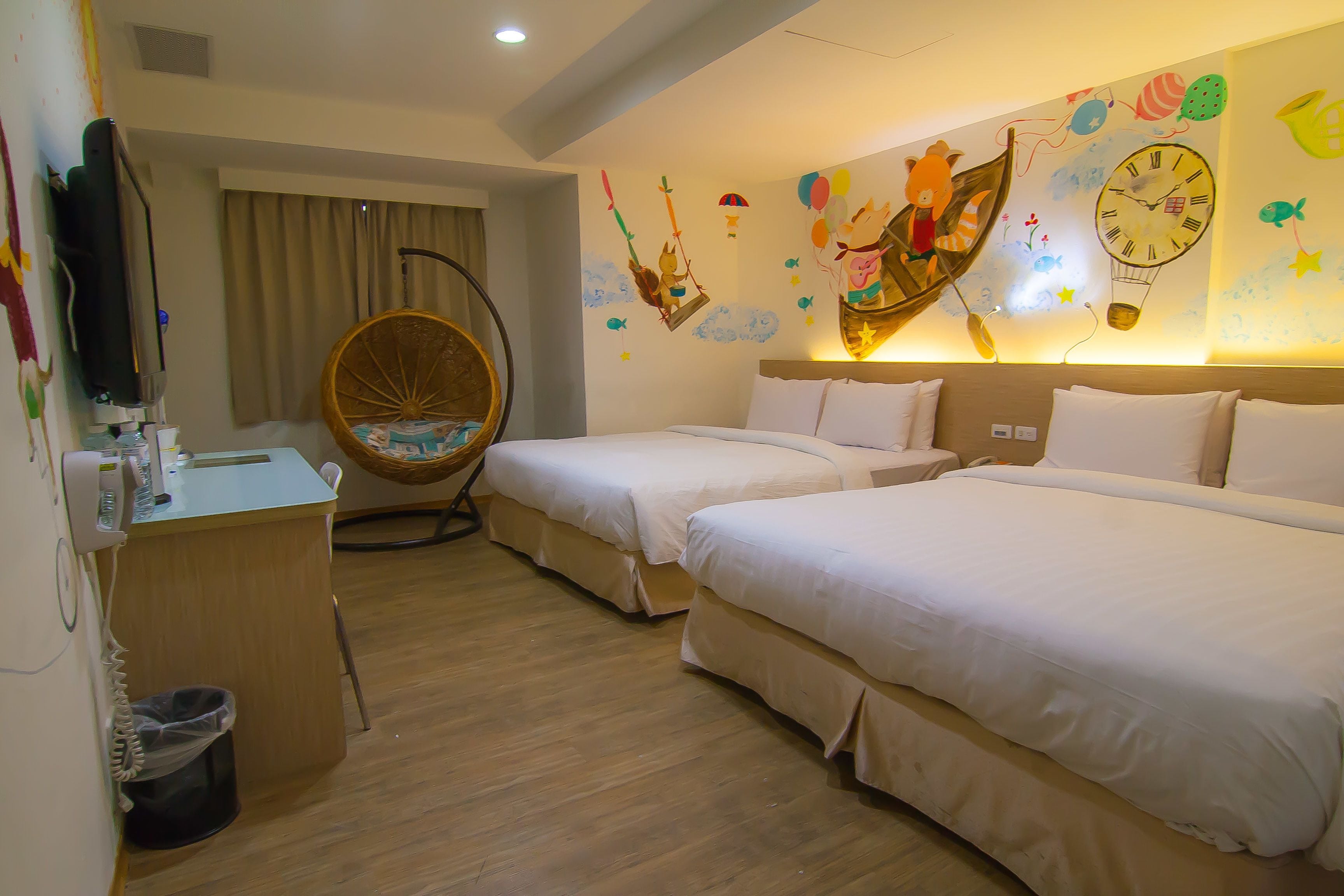 deluxe quadruple room, 2 queen beds | down duvets, minibar, in-room safe, individually decorated