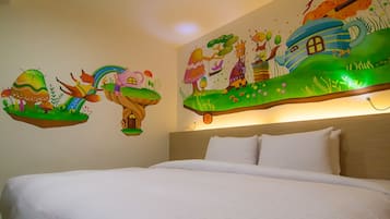 A bed with white linens, a wooden headboard, and a wall mural depicting a whimsical scene with mushrooms, a rabbit, and a house.