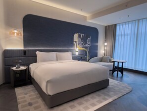 Ropa de cama de alta calidad y minibar 