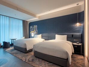 Ropa de cama de alta calidad y minibar 