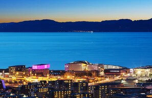 A cityscape with modern buildings, a waterfront, and a clear view of the water. - Clarion Hotel Trondheim (Trondheim)