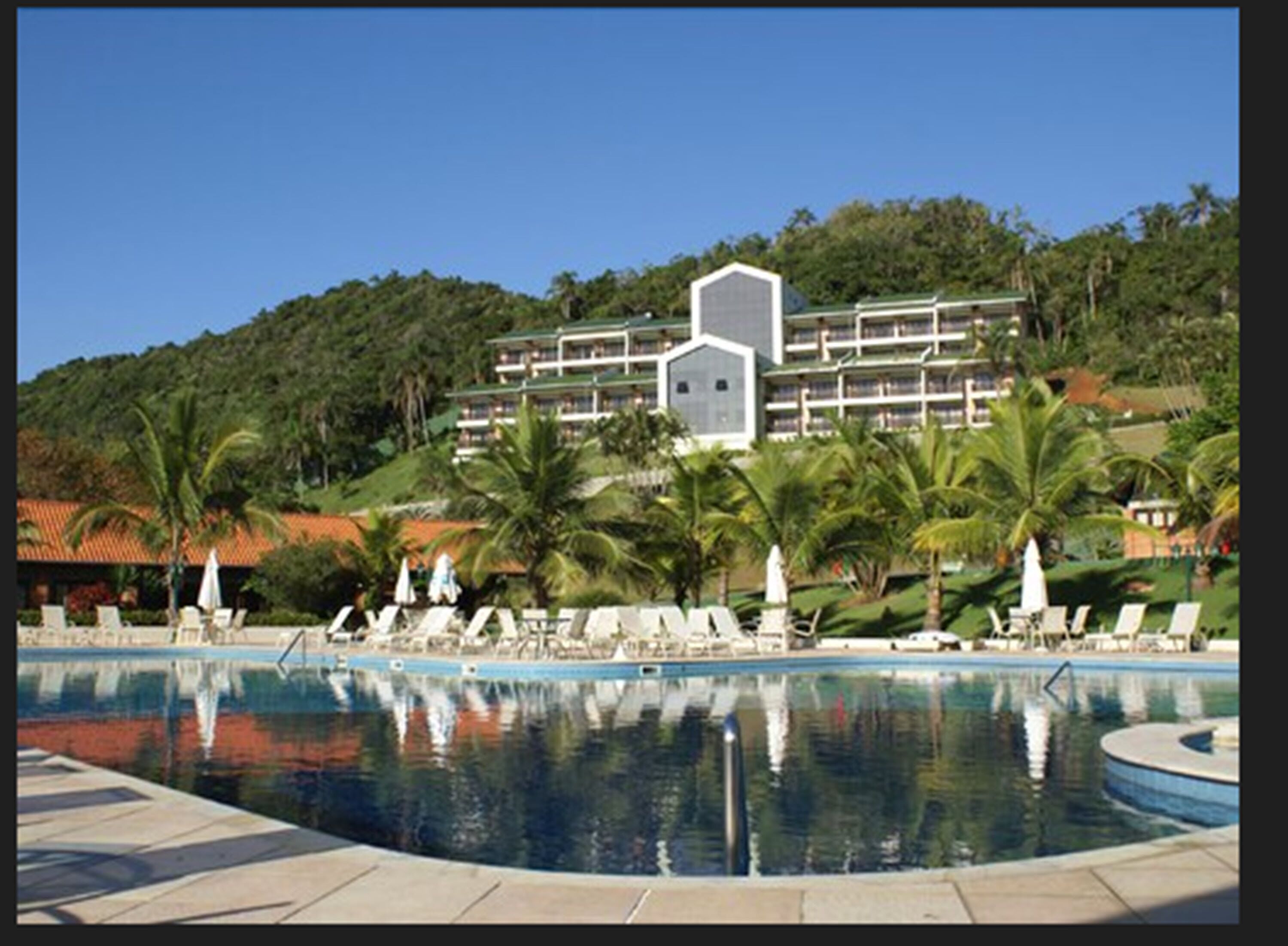 indoor pool, outdoor pool, open 9:00 am to 9:00 pm, pool umbrellas