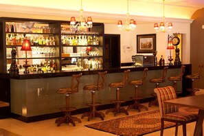 3 bars/lounges, swim-up bar, poolside bar, beach bar