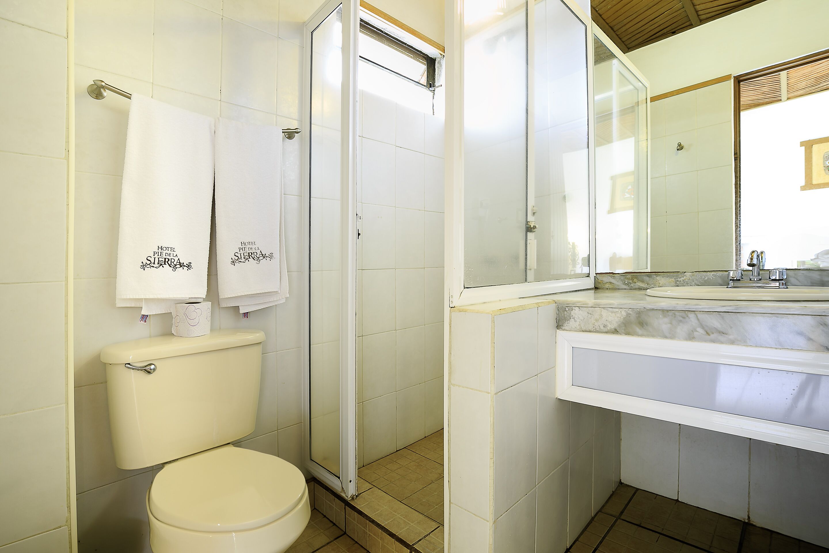 superior double room | bathroom | shower, free toiletries, hair dryer, towels