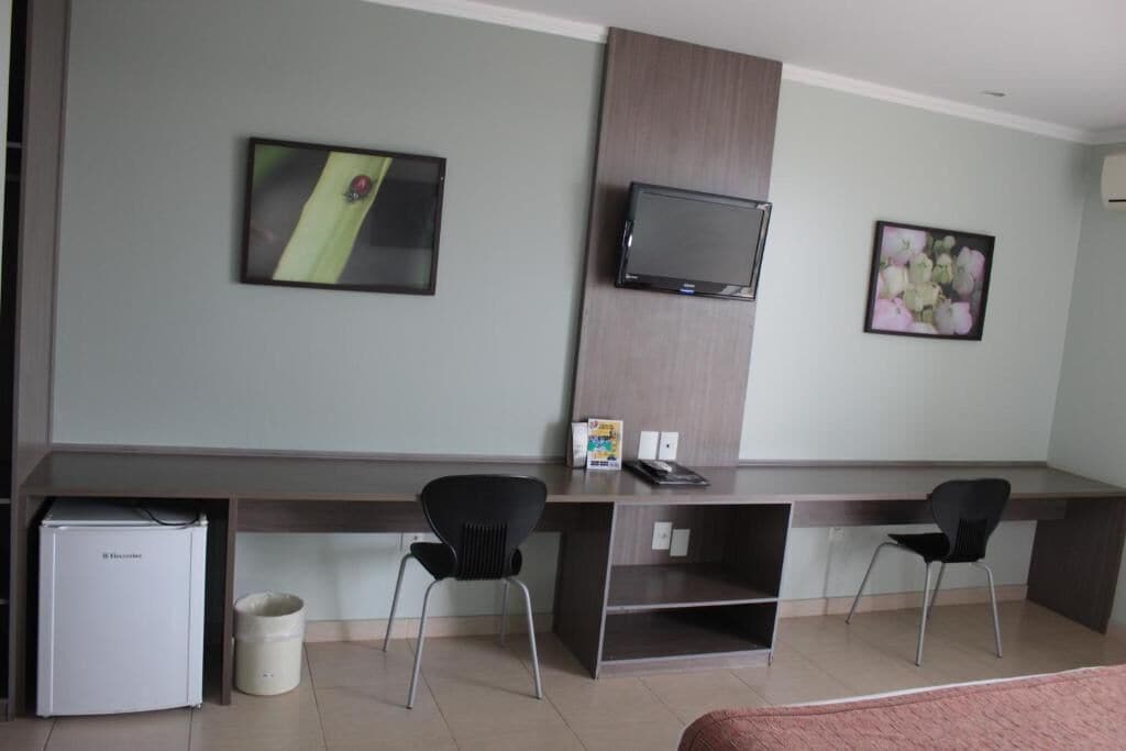 minibar, desk, laptop workspace, blackout curtains