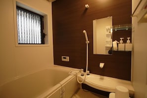 Baignoire et douche séparées, baignoire relaxante profonde