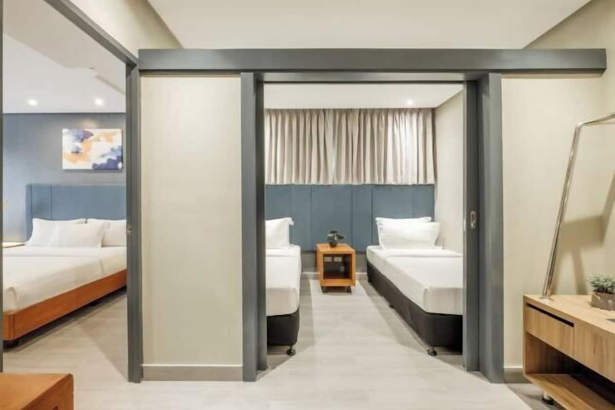 Luxe beddengoed, een minibar, een kluis op de kamer, een bureau