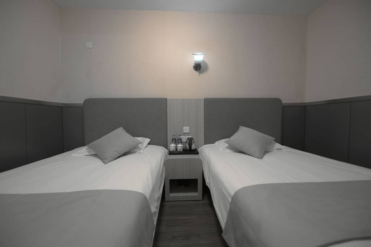 Standard Room, 2 Twin Beds (no windows) | In-room safe, soundproofing, iron/ironing board, WiFi (free)