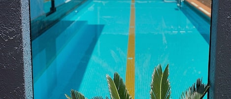 Outdoor pool, pool umbrellas, sun loungers