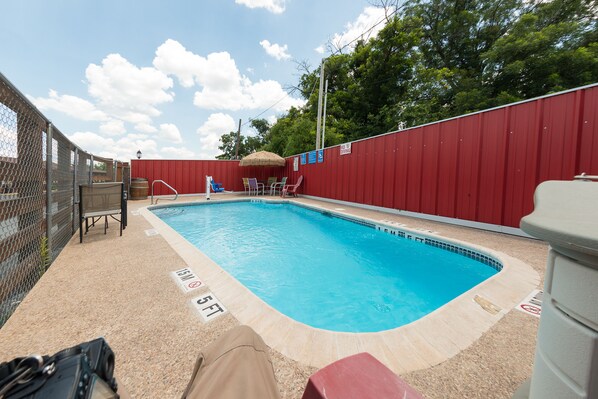 Seasonal outdoor pool, open 8:00 AM to 10:00 AM, pool umbrellas