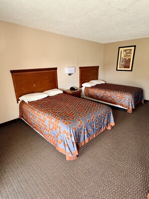 Desk, blackout drapes, iron/ironing board, rollaway beds