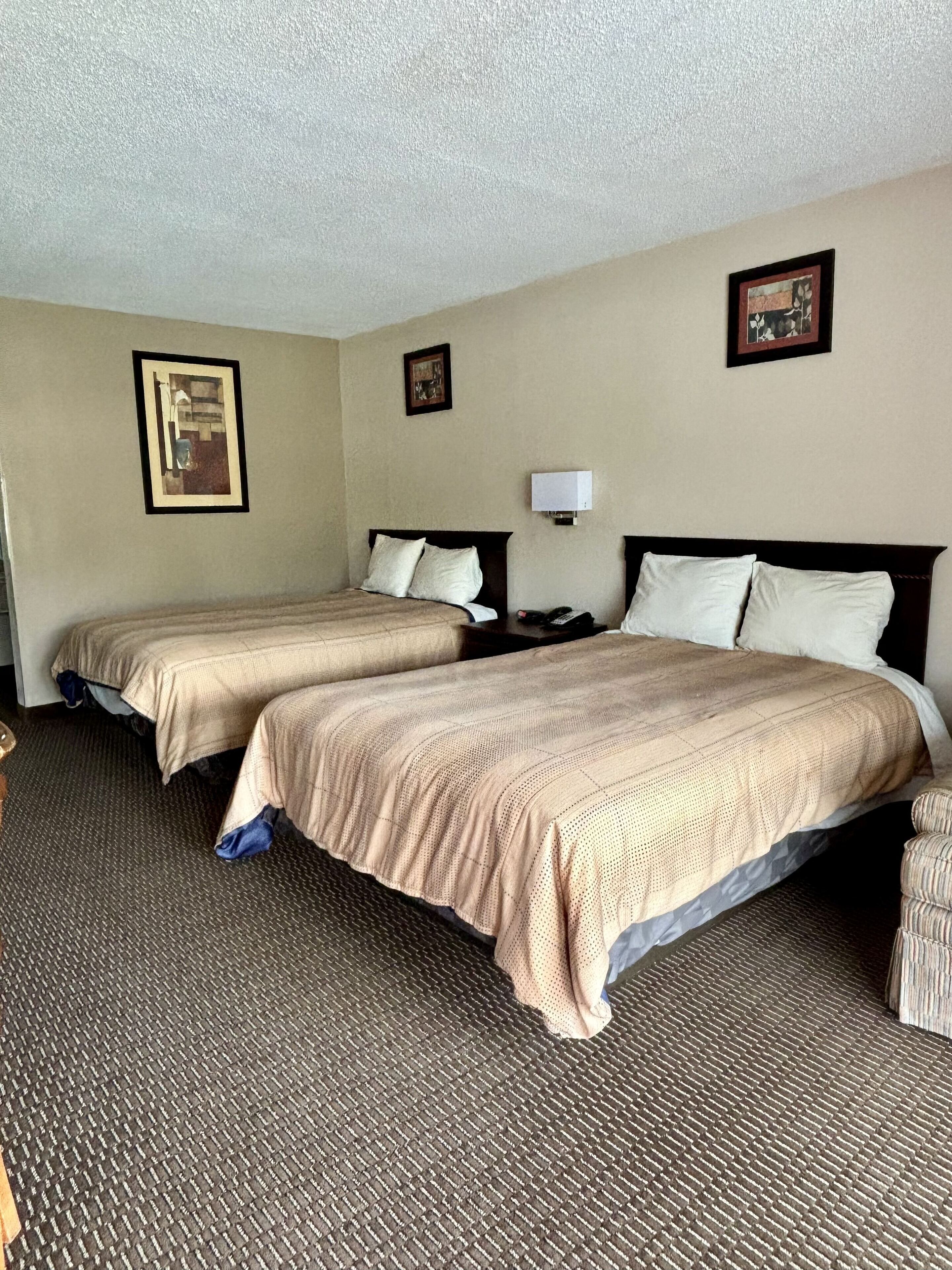 Desk, blackout curtains, iron/ironing board, rollaway beds