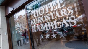 A hotel entrance with the name "Hotel Eurostars Ramblas" prominently displayed. - Ikonik Ramblas (Barcelona)