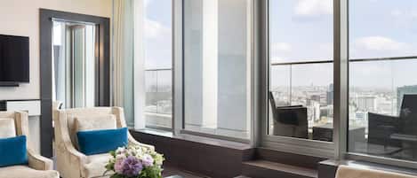 Premier Grand Suite, 1 King Bed, Balcony, Tower | Living area | 40-inch LCD TV with digital channels, TV, books