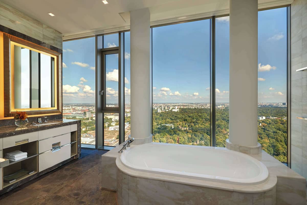 presidential suite, 1 king bed | bathroom | combined shower/bathtub, rainfall showerhead, designer toiletries