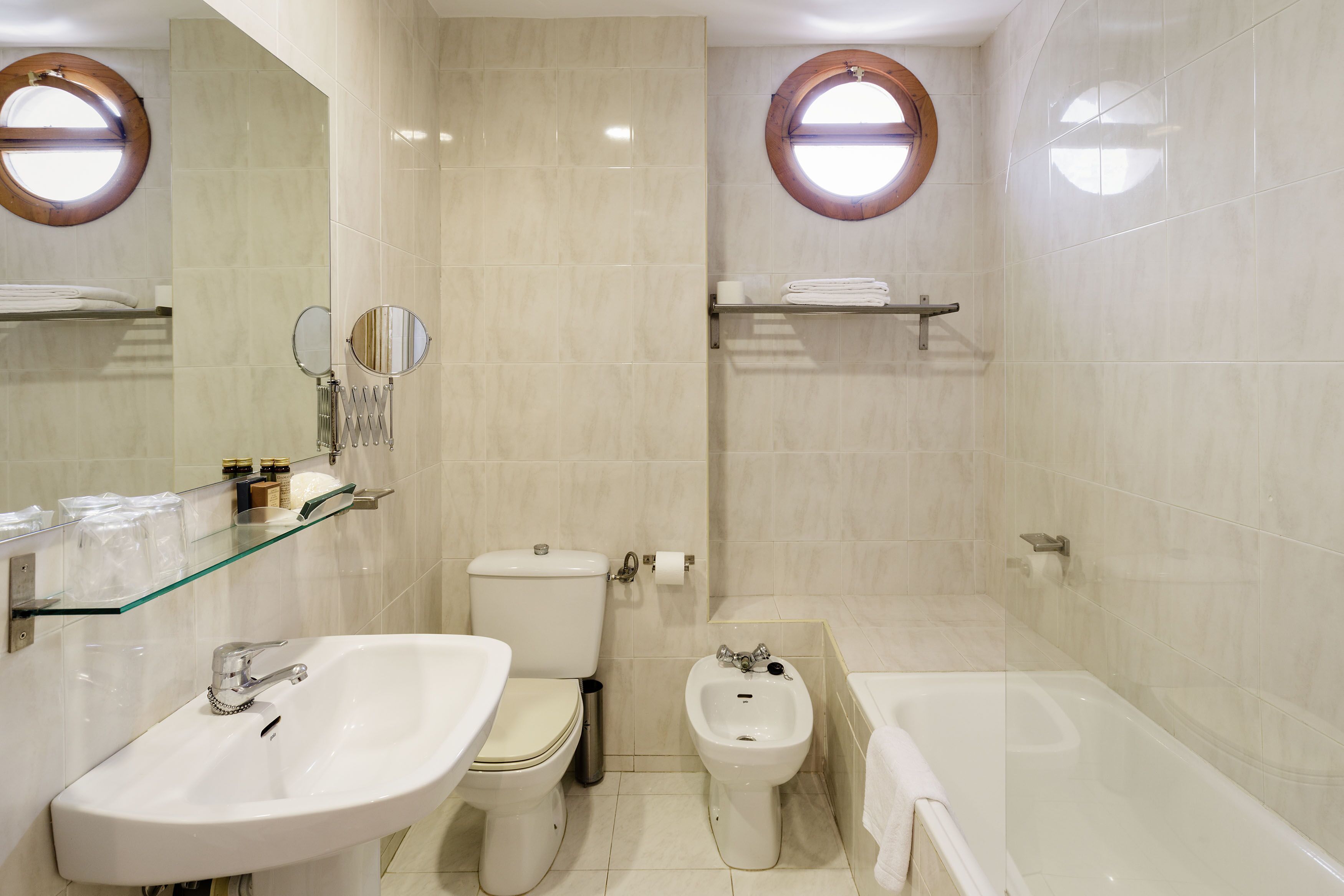 deep-soaking bathtub, free toiletries, hair dryer, towels