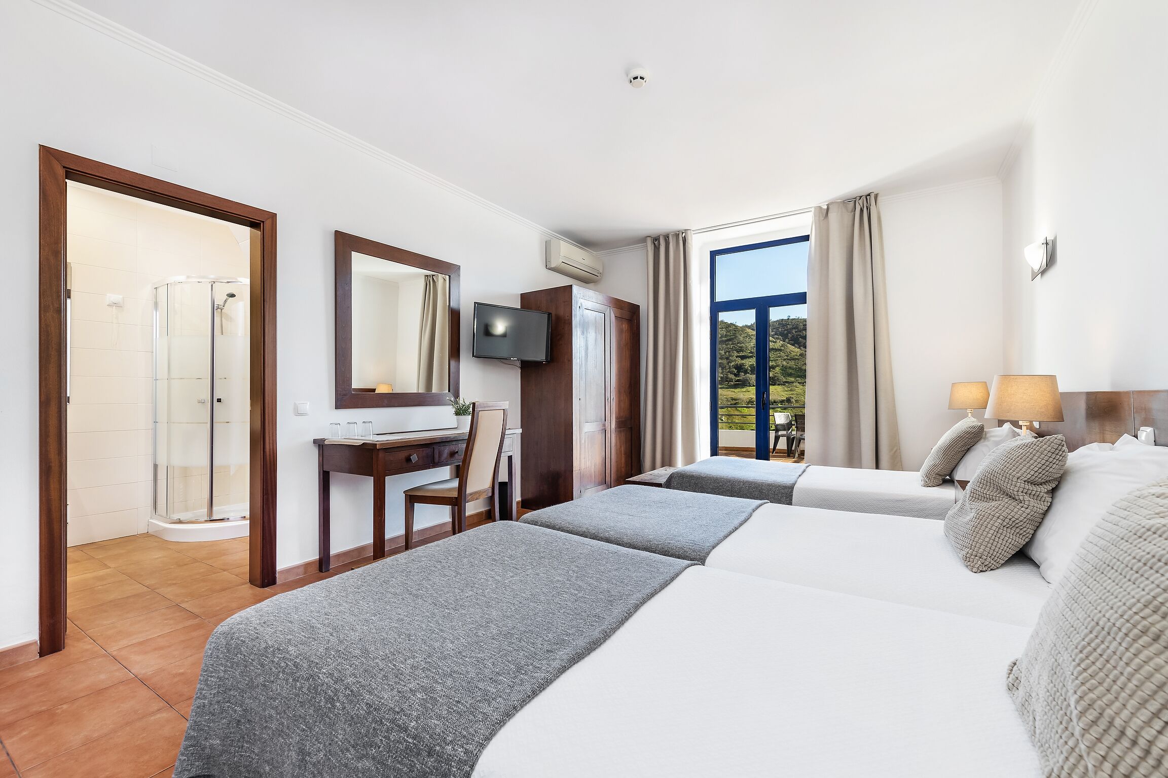 comfort triple room, river view | down duvets, desk, blackout curtains, free wifi