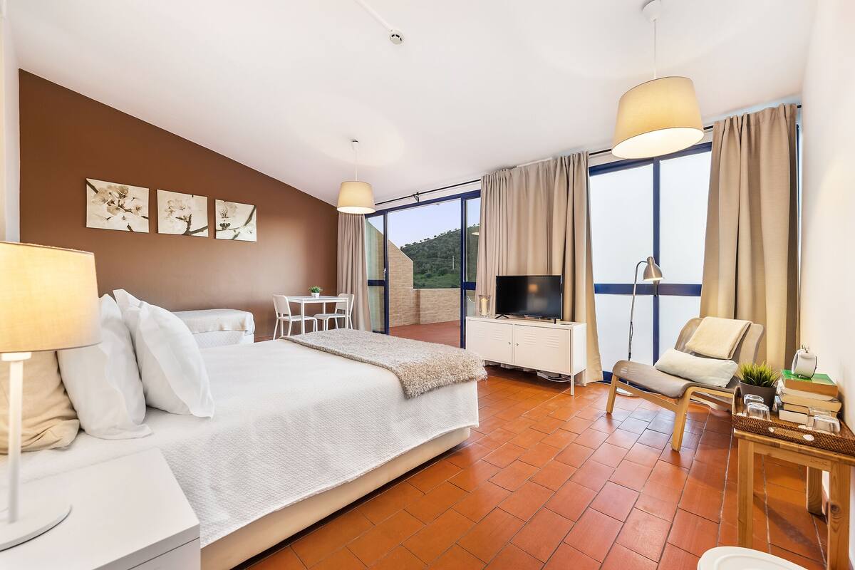 family room | down duvets, desk, blackout curtains, free wifi