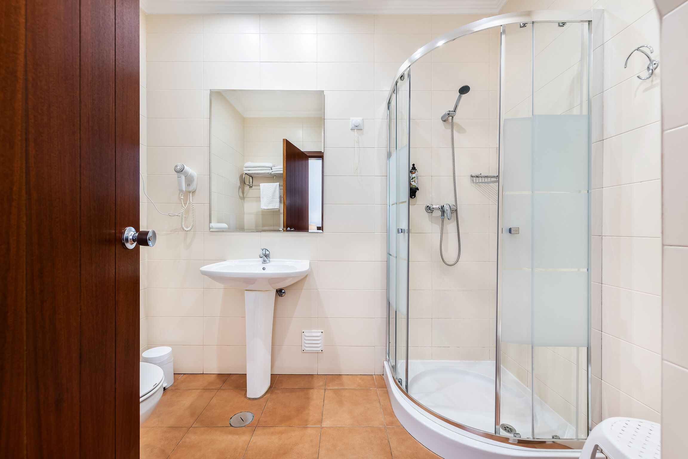 comfort triple room, river view | bathroom | hair dryer, towels