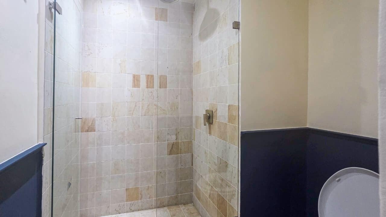 superior double room, 2 double beds | bathroom | shower, rainfall showerhead, hair dryer, towels