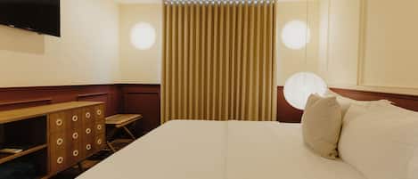 Habitación superior, 1 cama Queen size | Caja de seguridad en la habitación y decoración personalizada