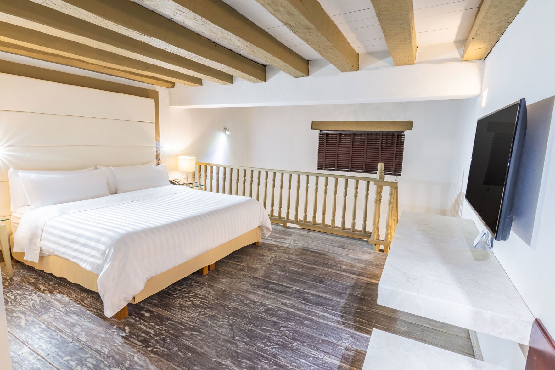 Premium bedding, down comforters, minibar, in-room safe