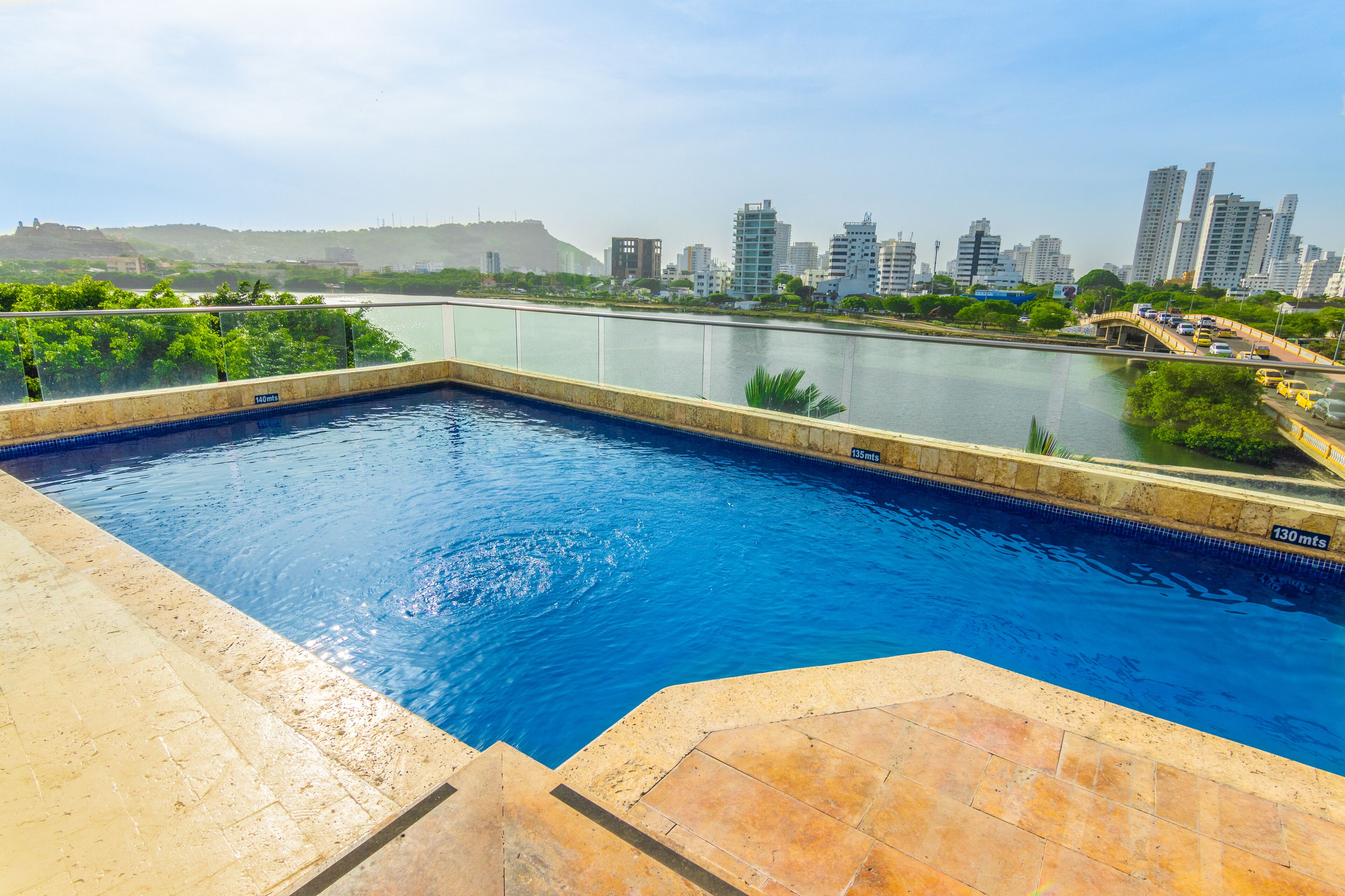 Outdoor pool, open 9 AM to 7 PM, pool loungers