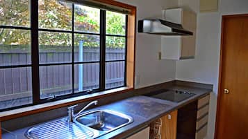 Four Bedroom Unit	 | Private kitchen | Fridge, microwave, stovetop, electric kettle