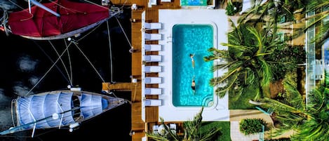 Outdoor pool, pool umbrellas, sun loungers