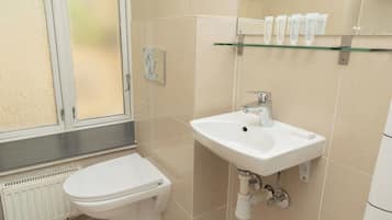 Double Room, Courtyard View | Bathroom | Shower, hydromassage showerhead, towels, soap