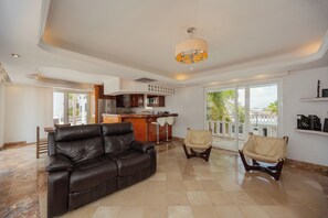 Romance Panoramic Penthouse | Living area | 32-inch Smart TV with digital channels