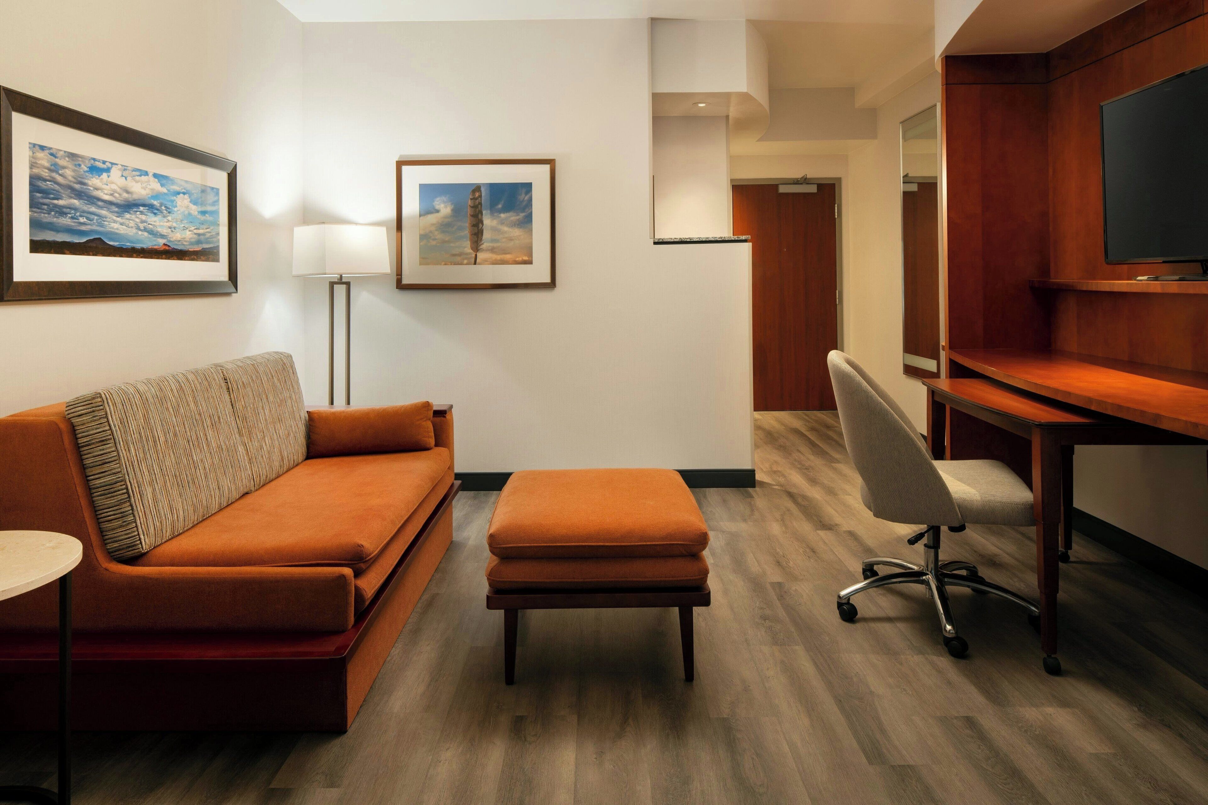 junior suite, 1 king bed with sofa bed | living area | flat-screen tv, pay films