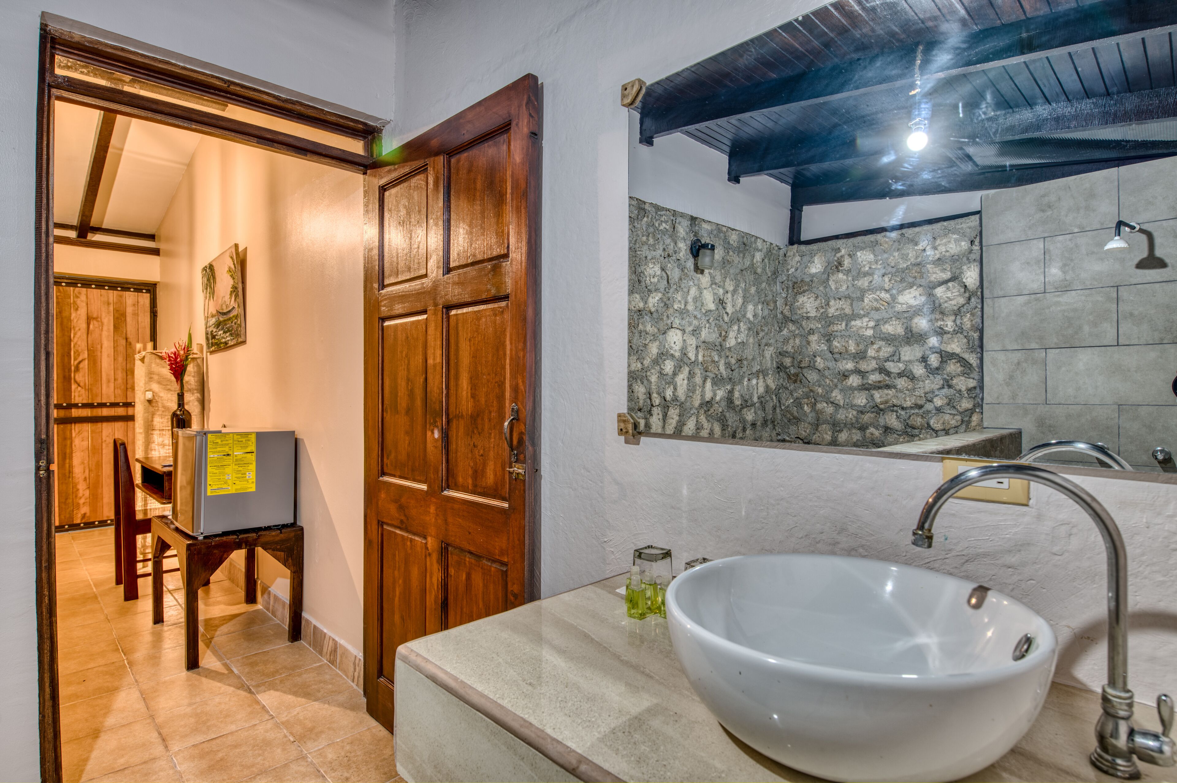 standard deluxe | bathroom | rainfall showerhead, towels, soap, shampoo