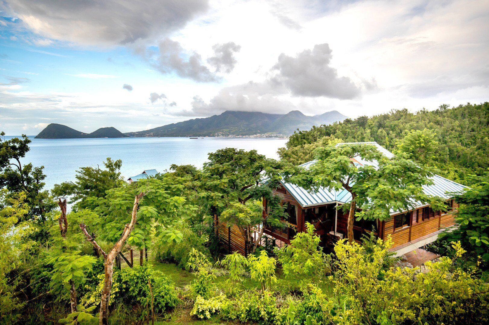 Peninsula Zabuco One-Bedroom Villas | Down comforters, in-room safe, desk, laptop workspace