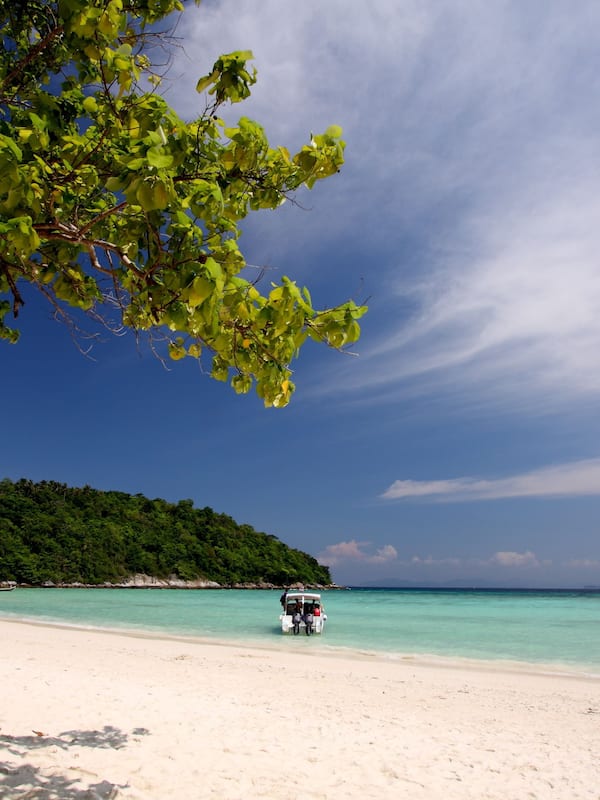On the beach, fishing