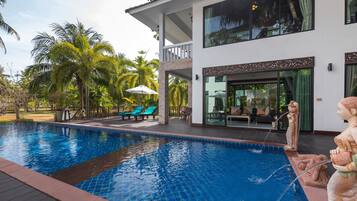 Outdoor pool, pool umbrellas, pool loungers