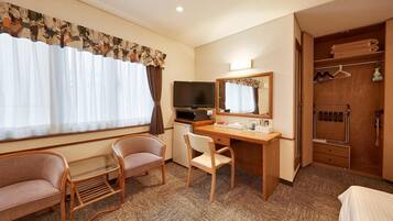 Triple Room, Multiple Beds, Non Smoking | Living room | 32-inch LCD TV with digital channels, TV