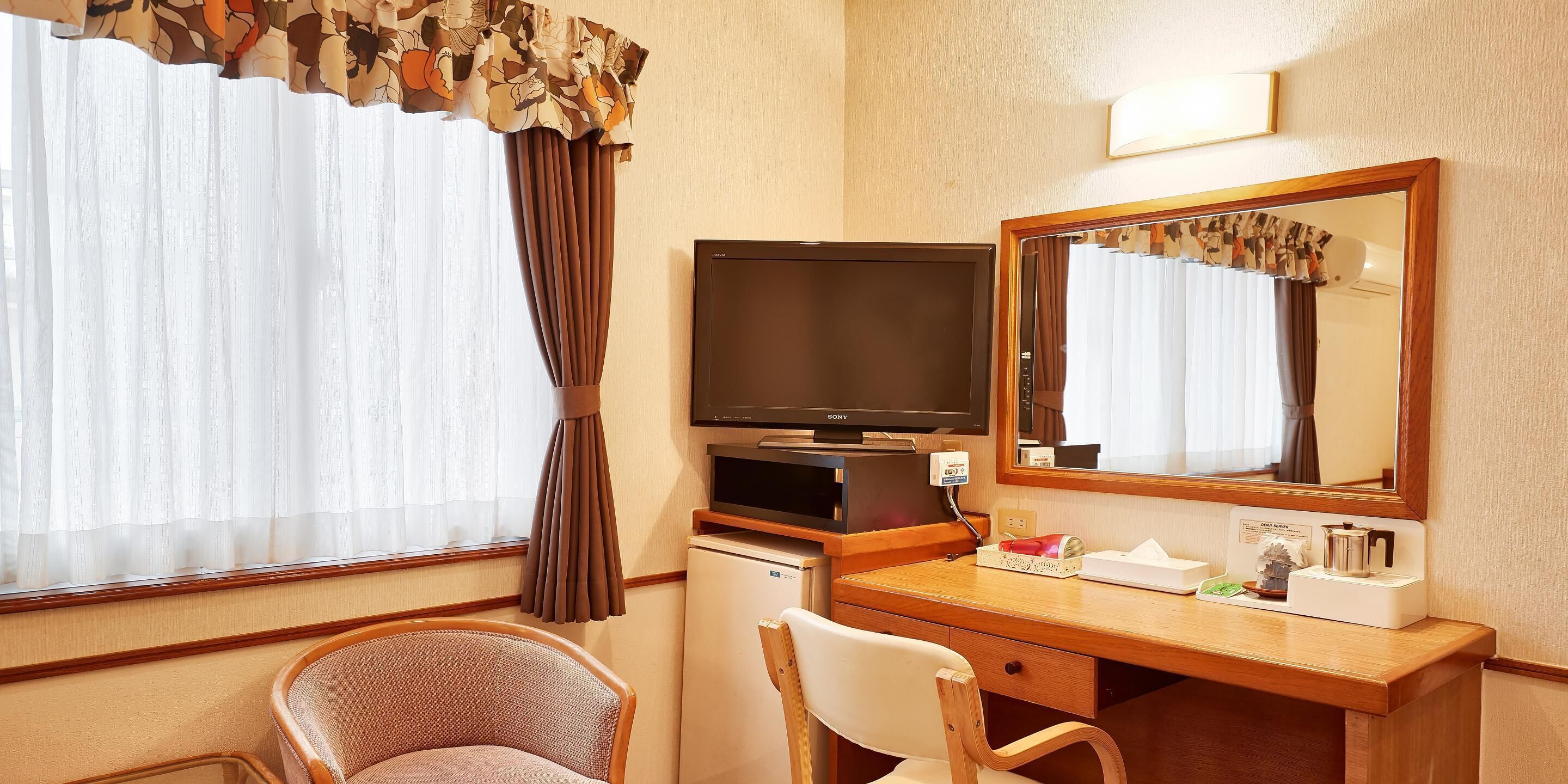 twin room, 2 double beds, non smoking | living area | 32-inch lcd tv with digital channels, tv