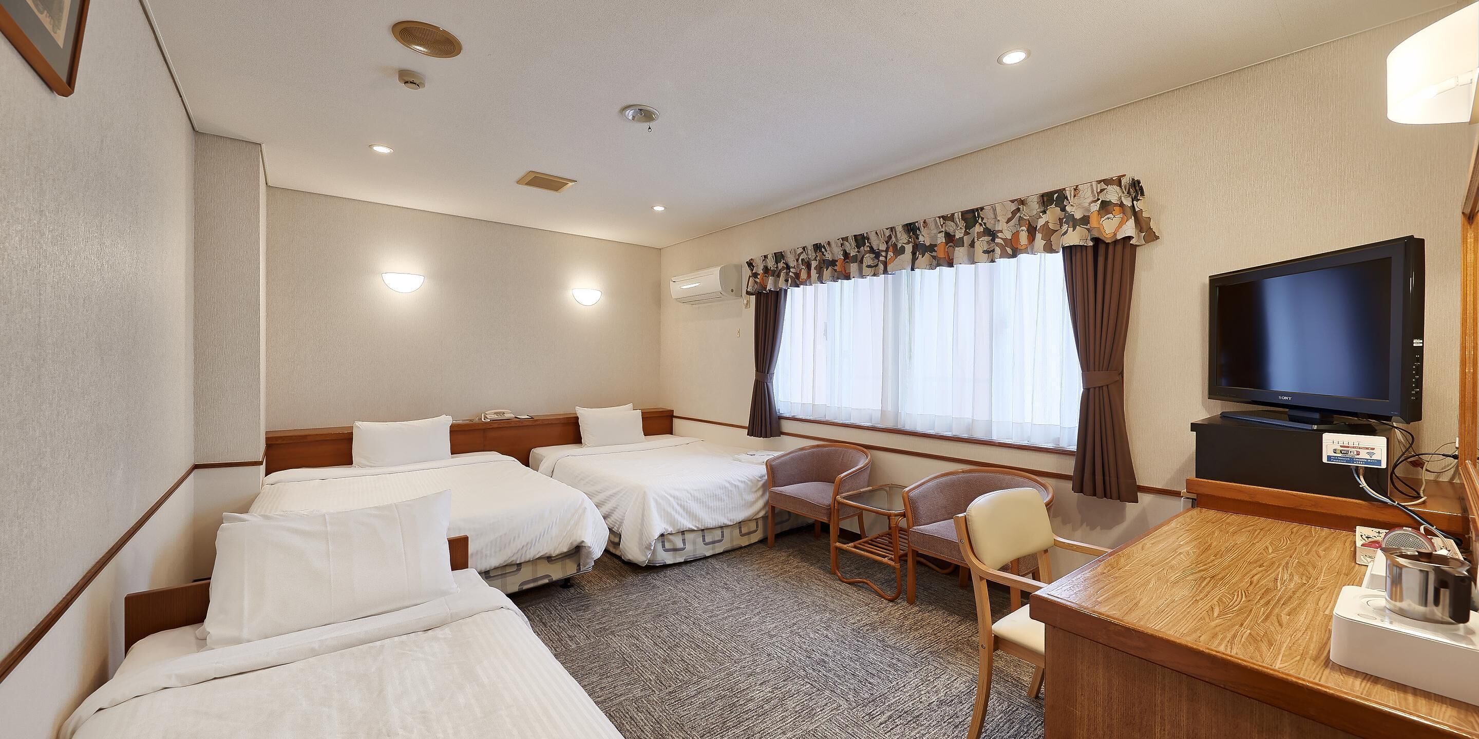 triple room, multiple beds, non smoking | 1 bedroom, down duvets, desk, laptop workspace