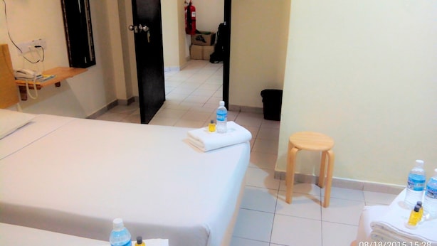 Habitación cuádruple familiar | Sala de estar