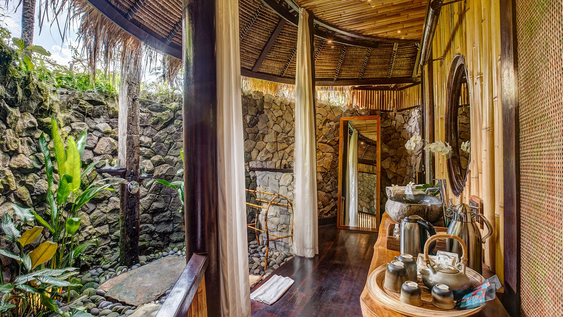 riverfront pool suite | bathroom | separate bathtub and shower, rainfall showerhead, free toiletries