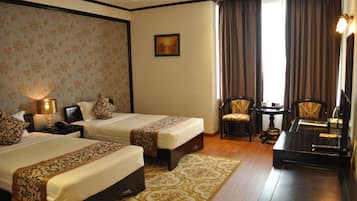 Deluxe Room | 2 bedrooms, minibar, in-room safe, desk