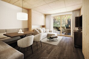 Suite | Área de sala de estar | Televisión de pantalla plana 