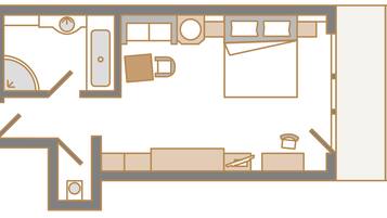 A floor plan with a kitchen, dining area, and a separate living area.