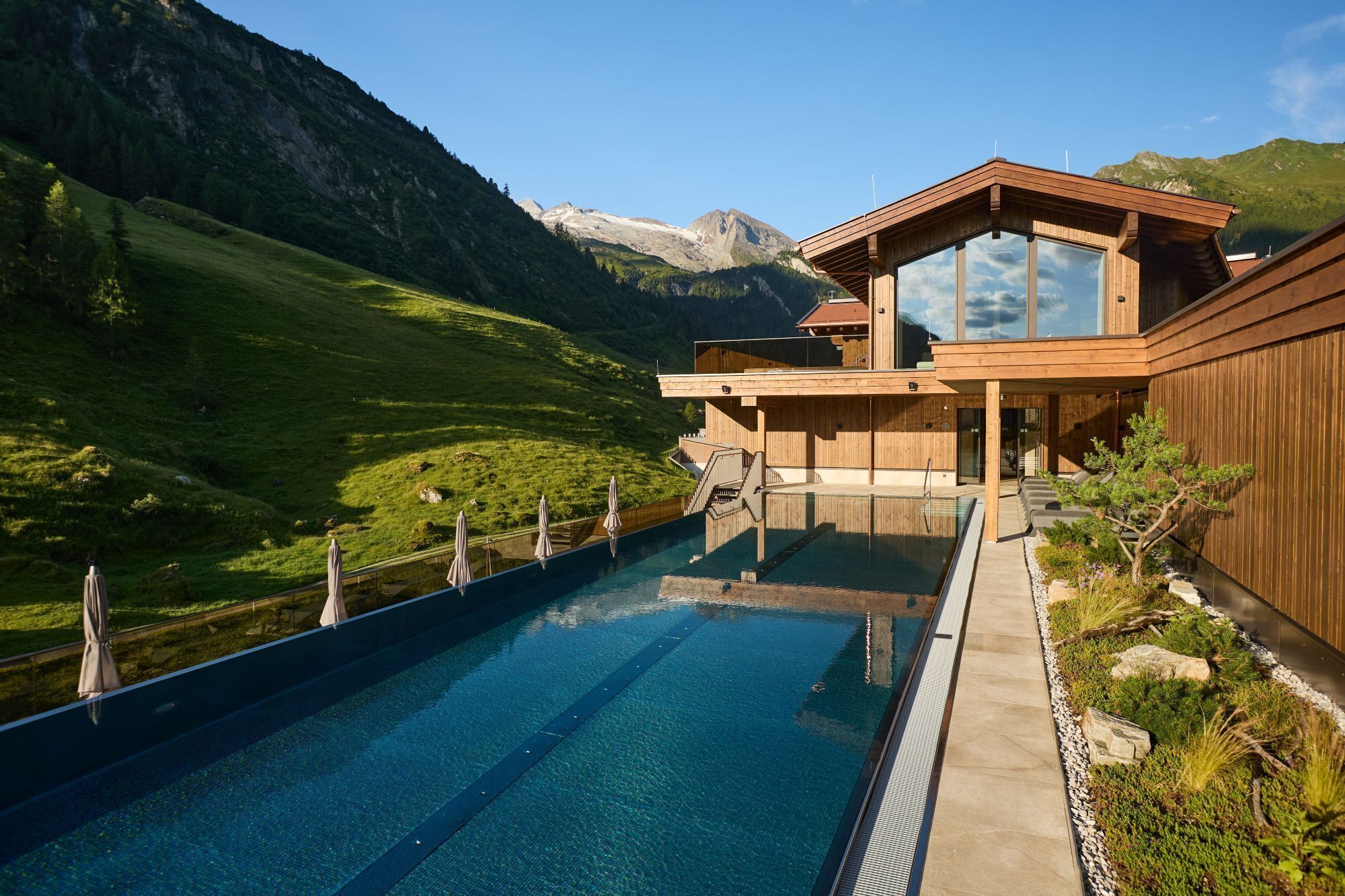 Indoor pool, outdoor pool, open 7 AM to 8 PM, pool loungers