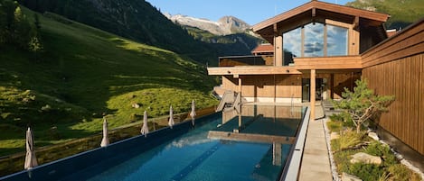 Indoor pool, outdoor pool, open 7 AM to 8 PM, sun loungers