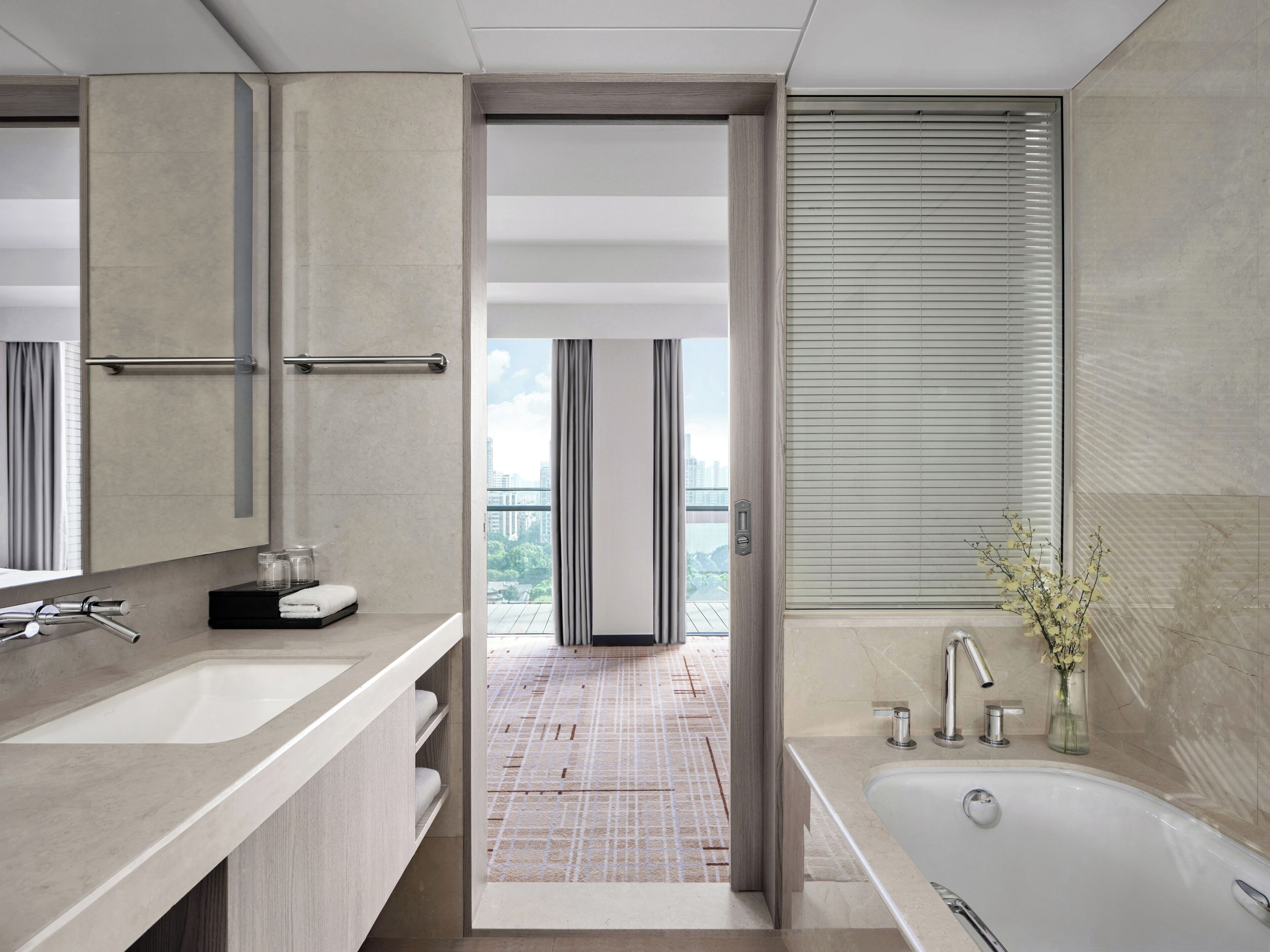 designer toiletries, hair dryer, bathrobes, slippers