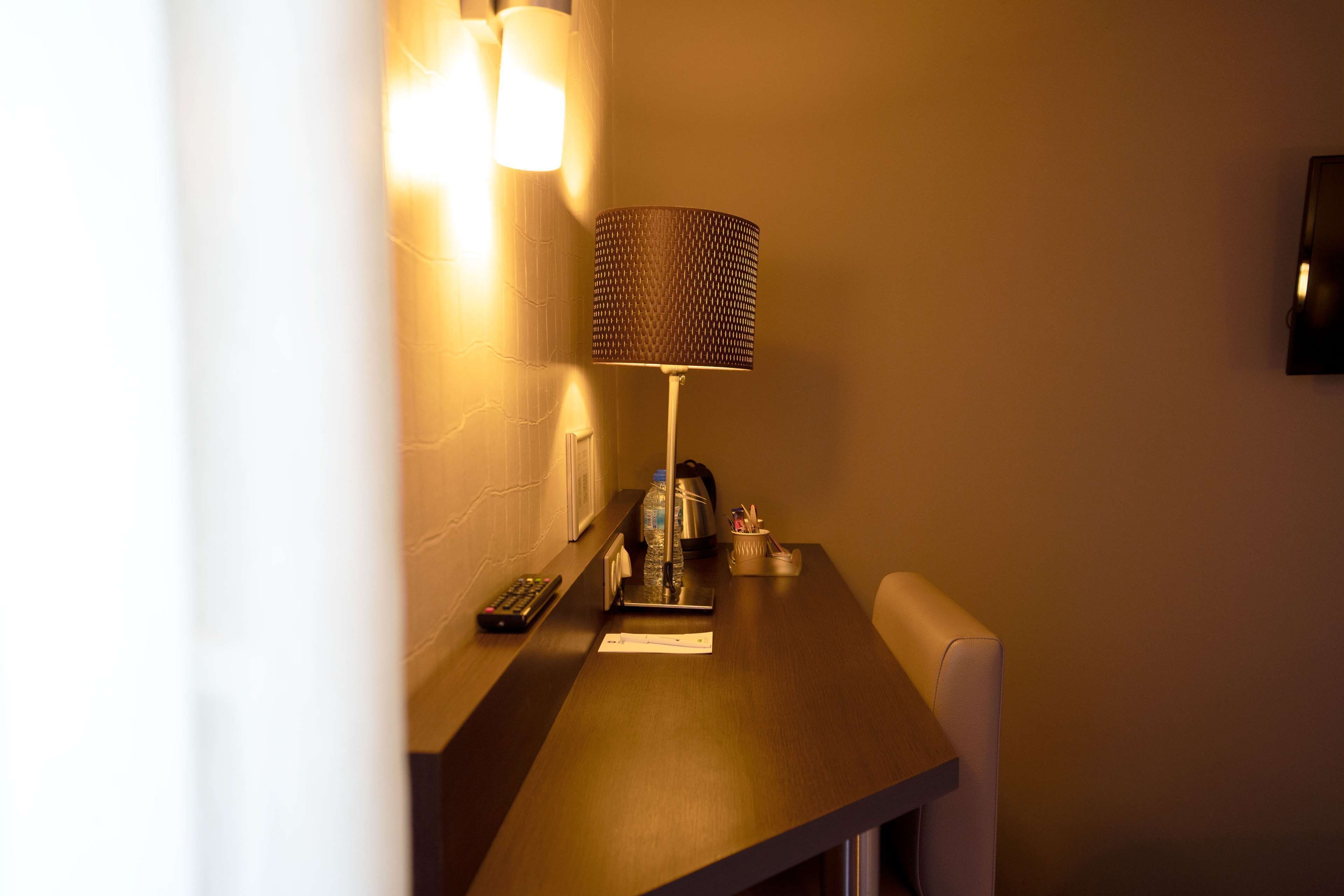 premium room, 1 queen bed, non smoking | in-room safe, desk, laptop workspace, blackout curtains