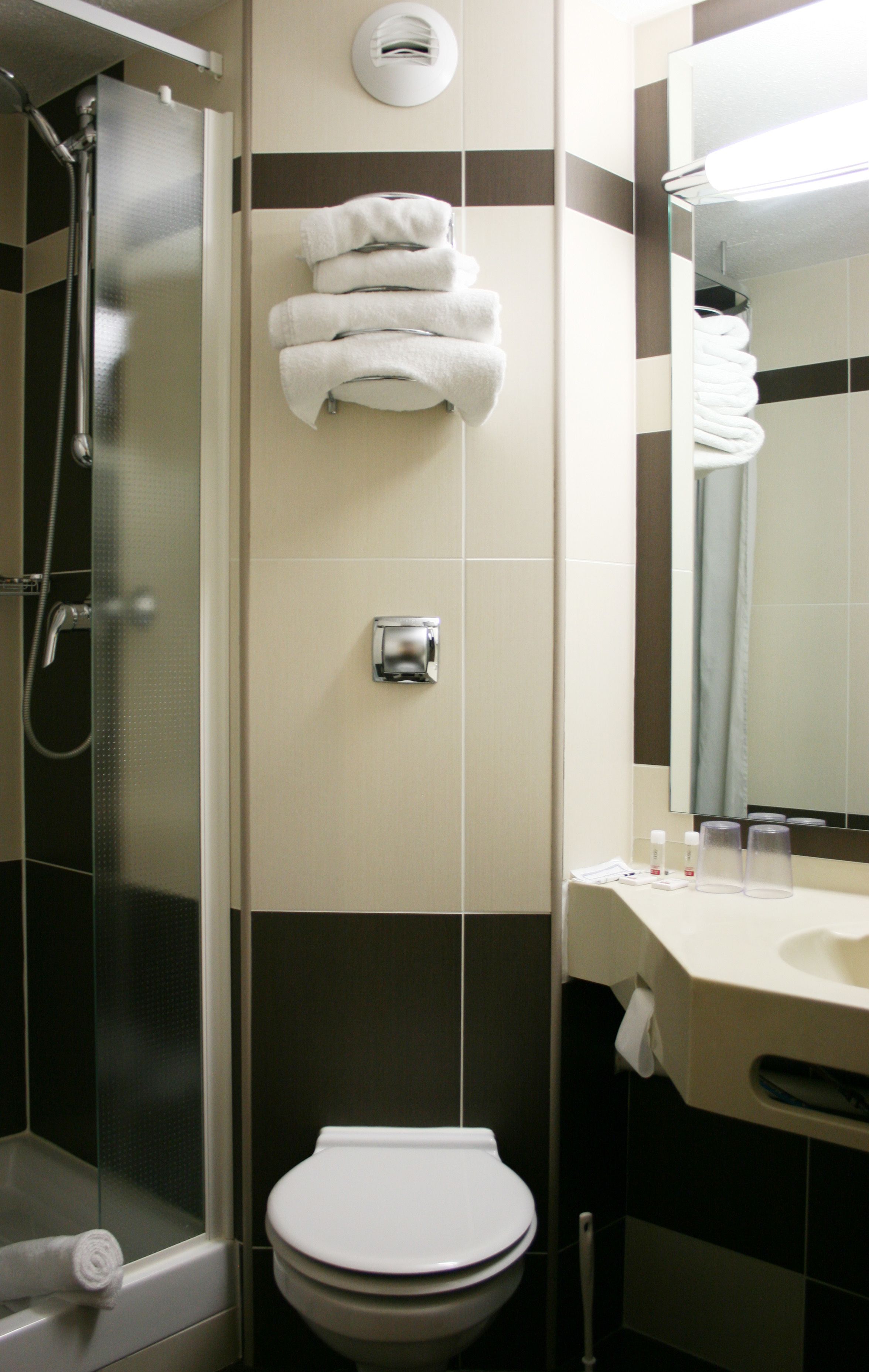 shower, free toiletries, hair dryer, towels