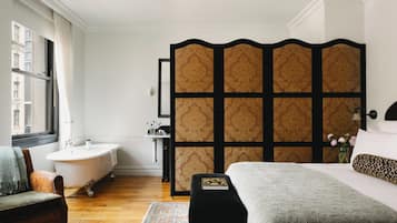 Premium bedding, down comforters, minibar, in-room safe